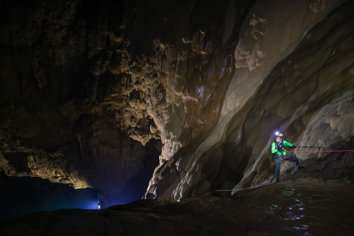 Visitors climb down during a tour in Son Doong cave, one of the world's largest natural caves, in central Vietnam's Quang Binh province on January 19, 2021. Photo by Ngo Tran Hai An.