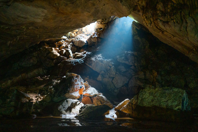 Sunbeam shining into Nuoc Nut Cave