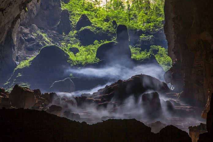 The misty cloud in Doline 2 - Son Doong on summer days