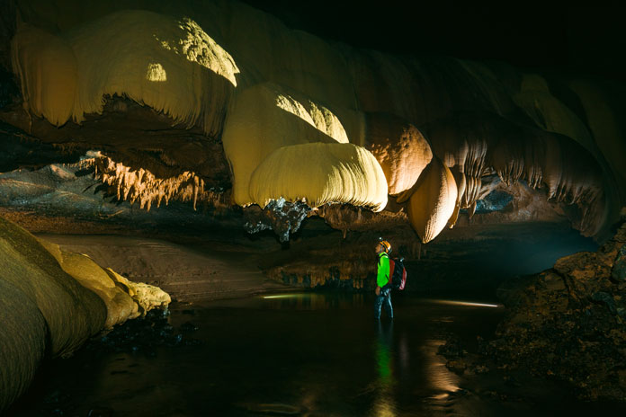 Plenty of stalactites and stalagmites can be seen in Hang Va Cave