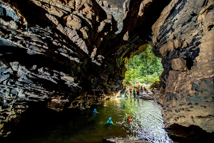 Swim towards Hung Ton Cave entrance.