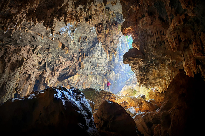 The huge arch of the Kim Cave.
