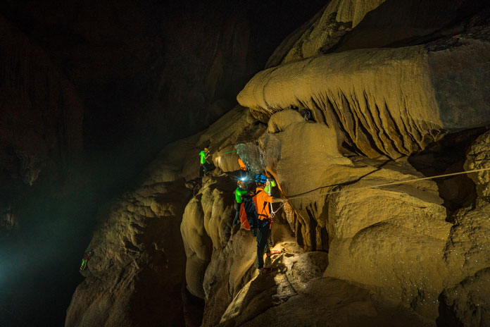 Experience 20m rope traverse with harnesses on Hang Va Expedition tour