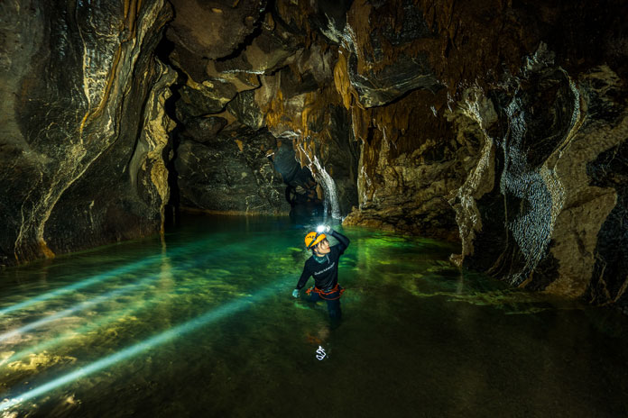 Turquoise underground river of Hang Va Cave