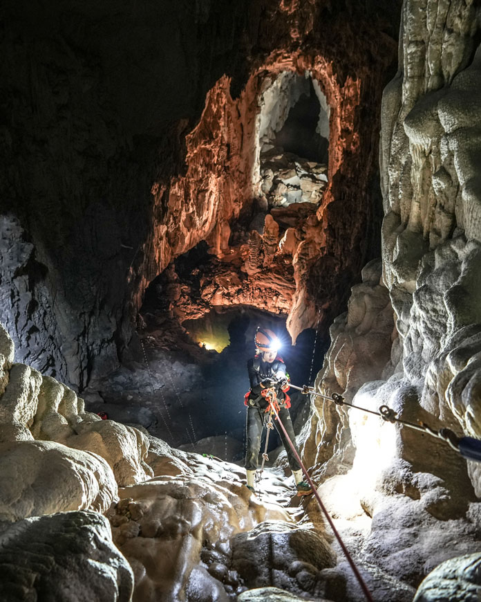 Descending into the Son Doong cave with safety equipment